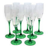 8 large green stem champagne flutes in very good condition.