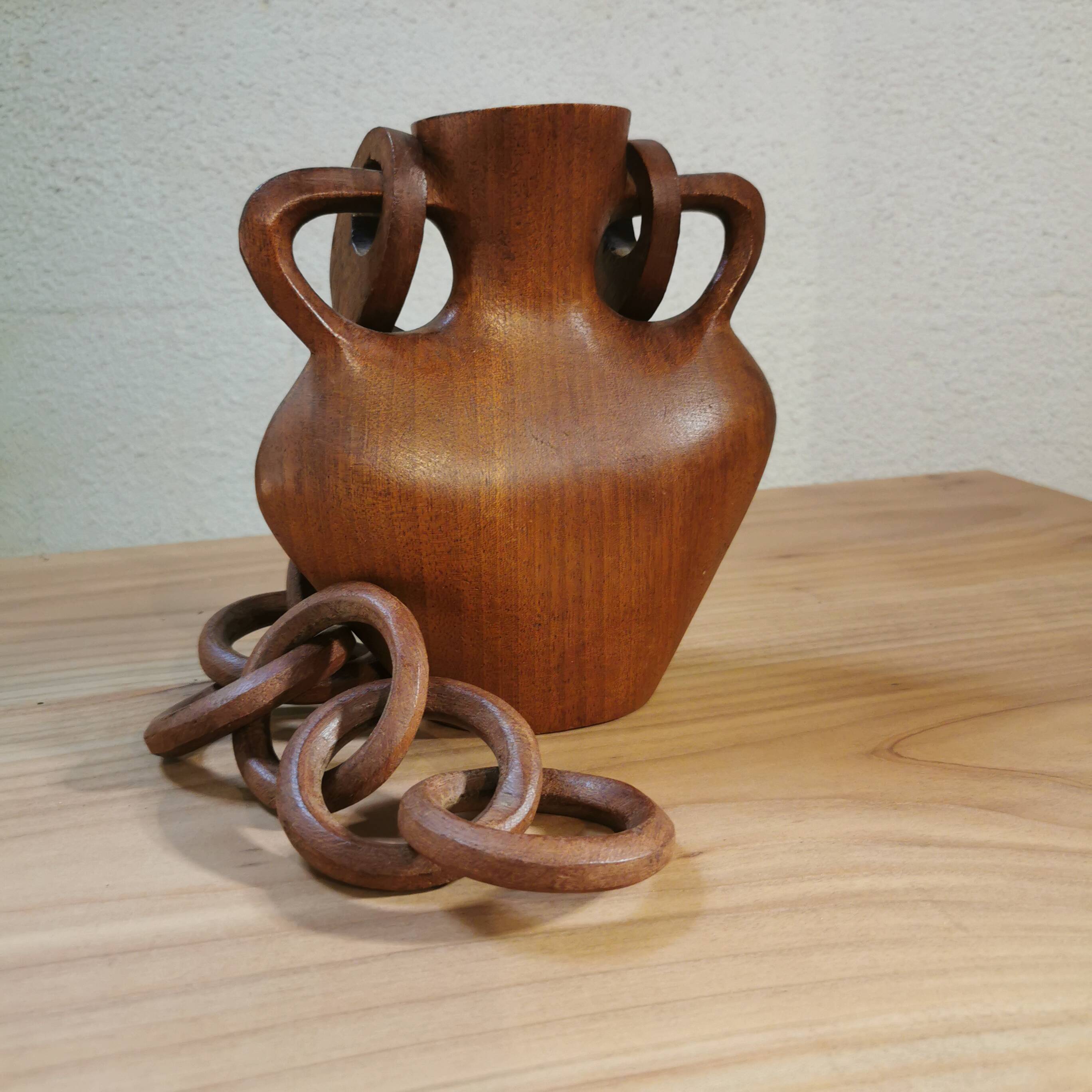 Vase with carved wooden handles