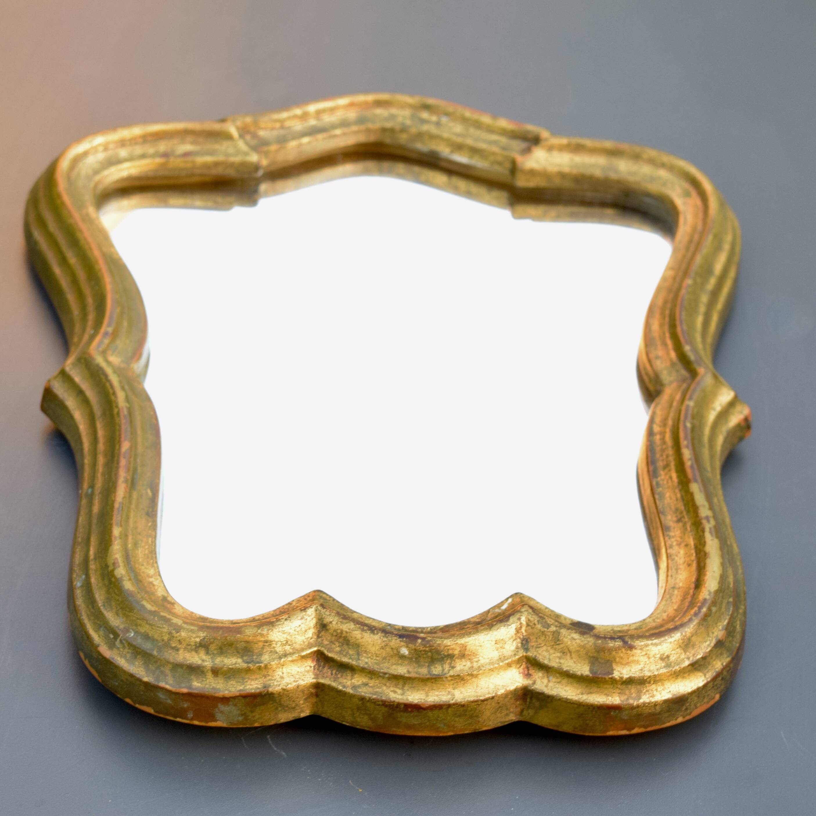 Mirror in gilded painted wood - 1960s