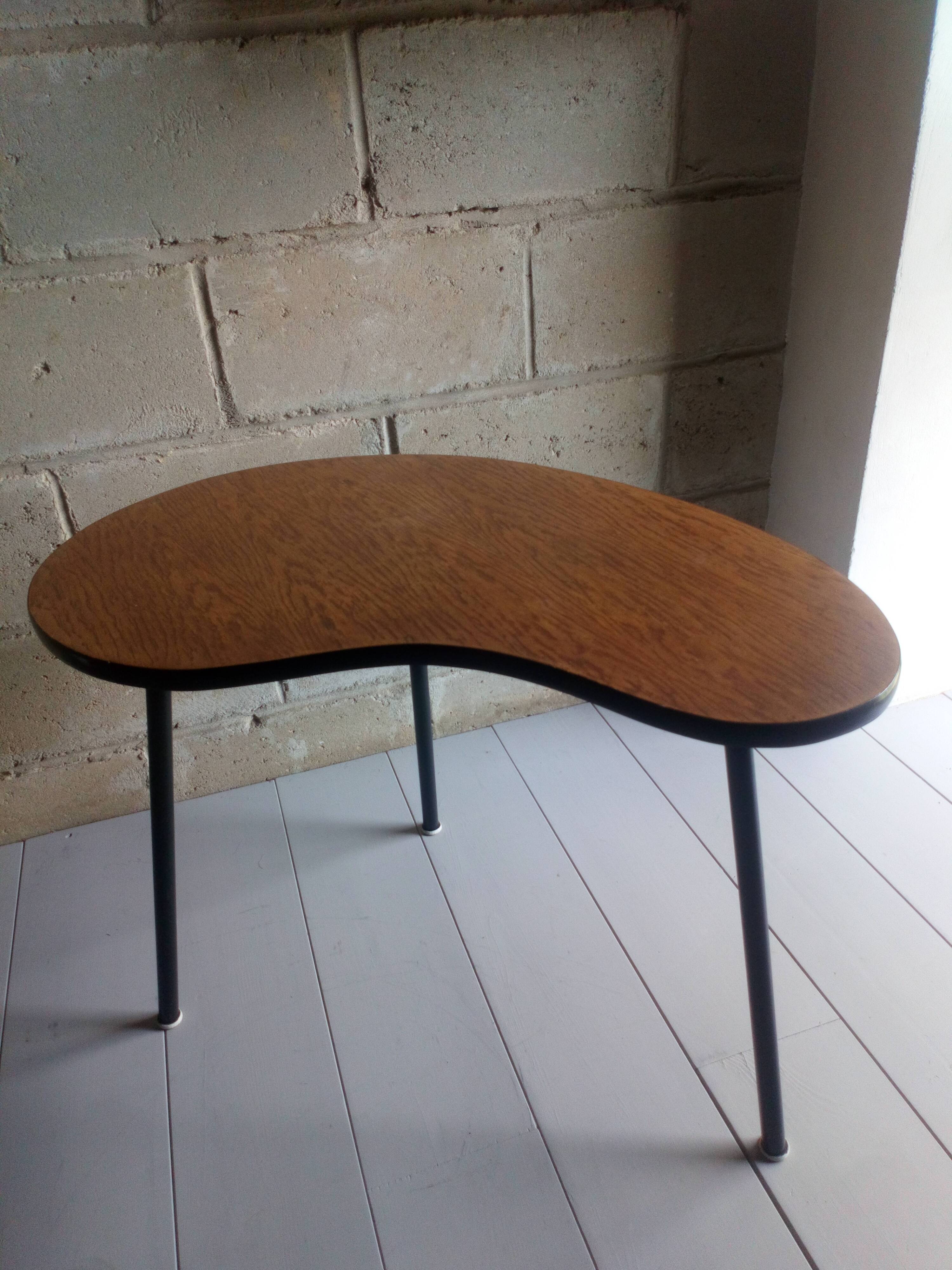 Scandinavian side table shaped bean with three feet
