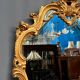 Golden mirror. Wood.