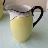 Coffee pot or teapot, sugar bowl and milk jug in porcelain.