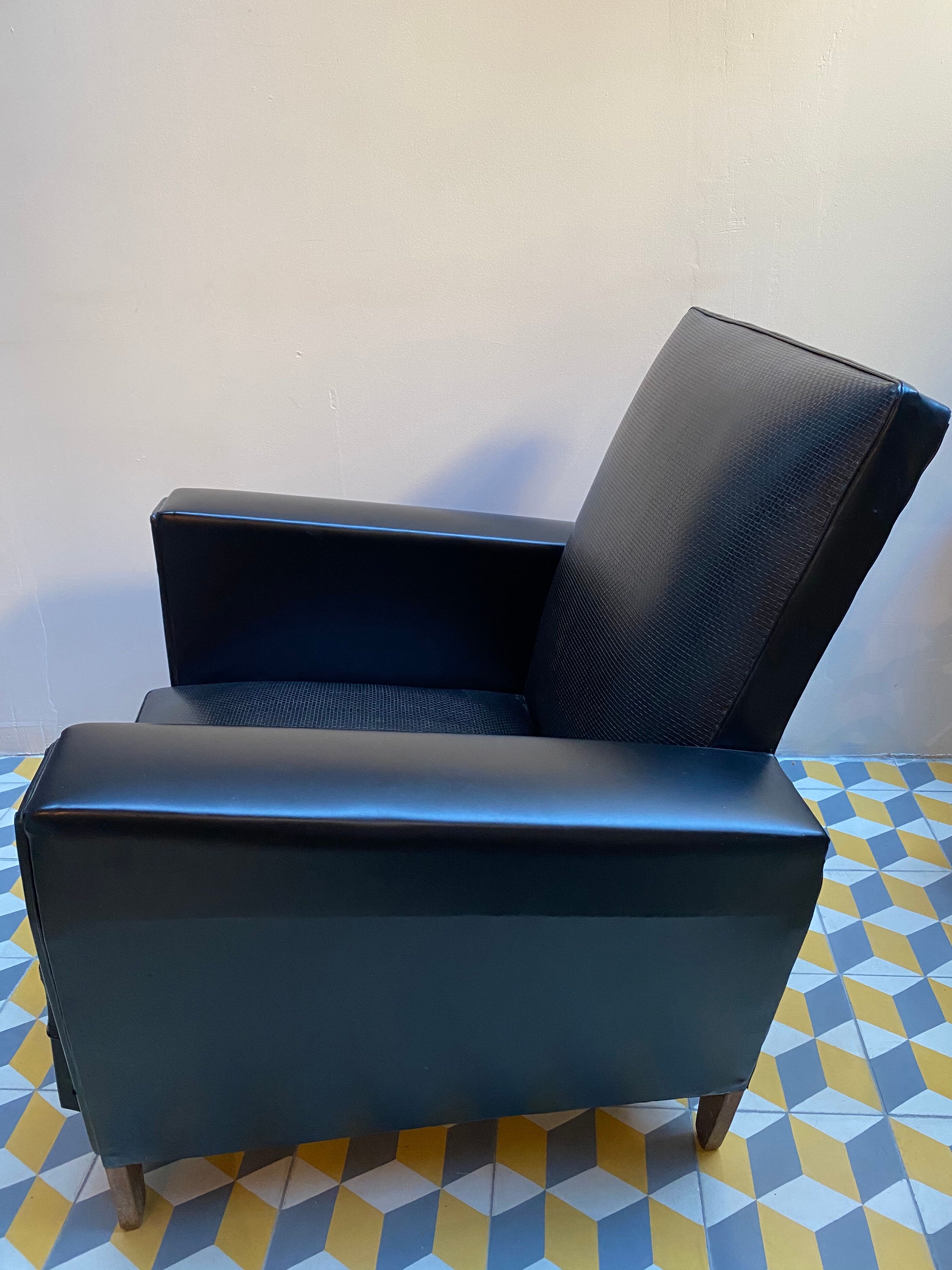 Vintage armchair skaï