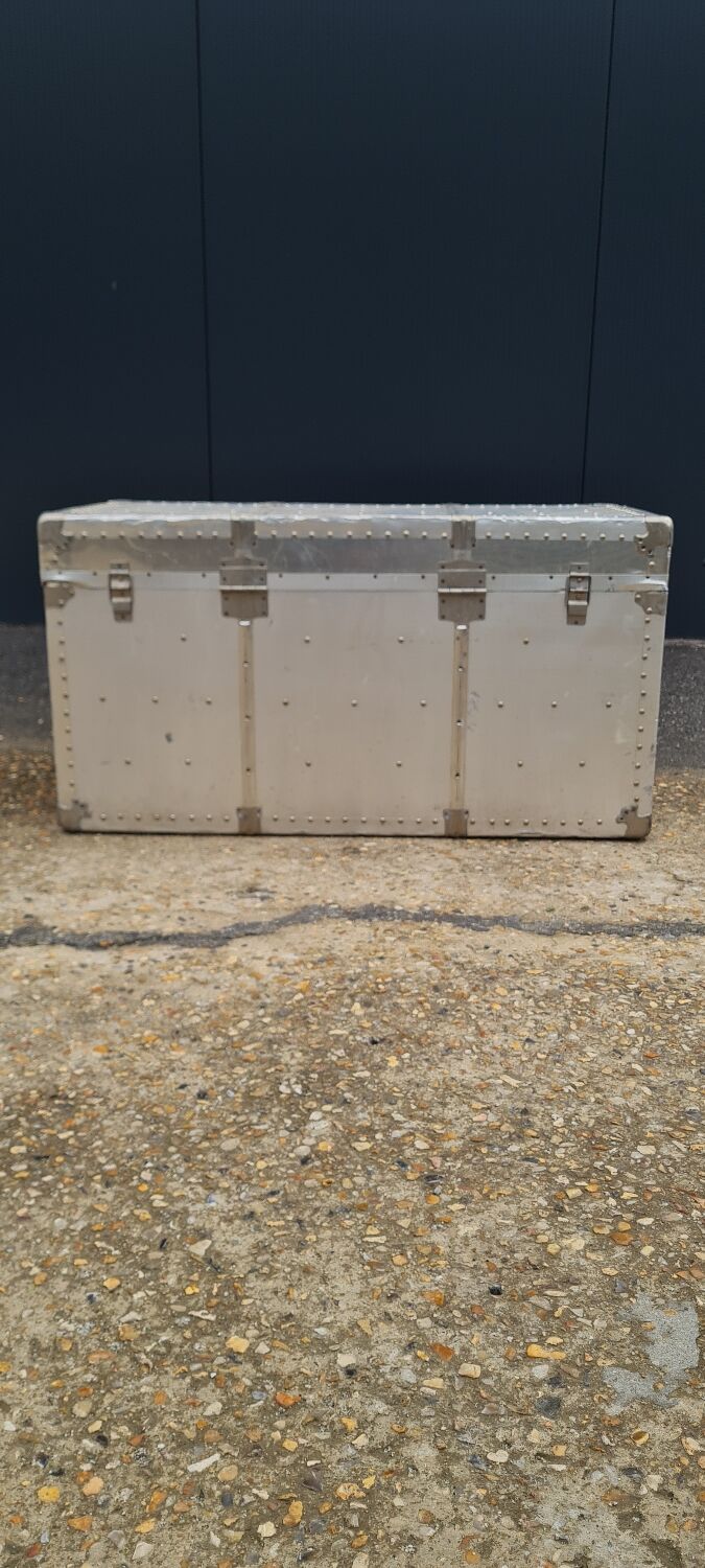 Riveted metal transport trunk