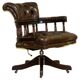 Restored Chesterfield captain's armchair in leather with an oak frame.