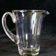 Pitcher Carafe has orangeade em blown glass