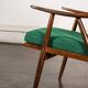 Boomerang chair in green fabric