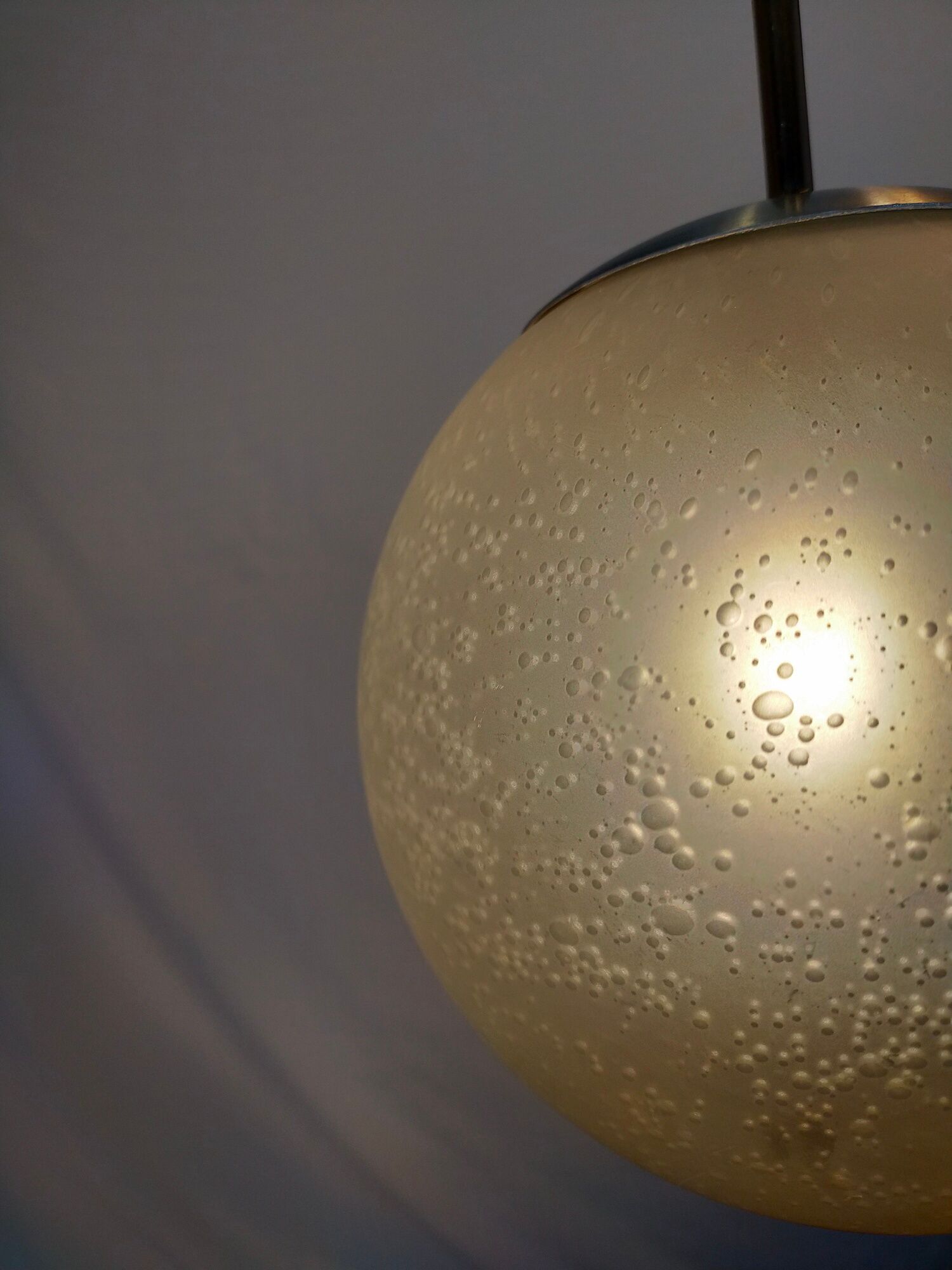 Suspension in blown and sandblasted glass, by Raak, from the 70s
