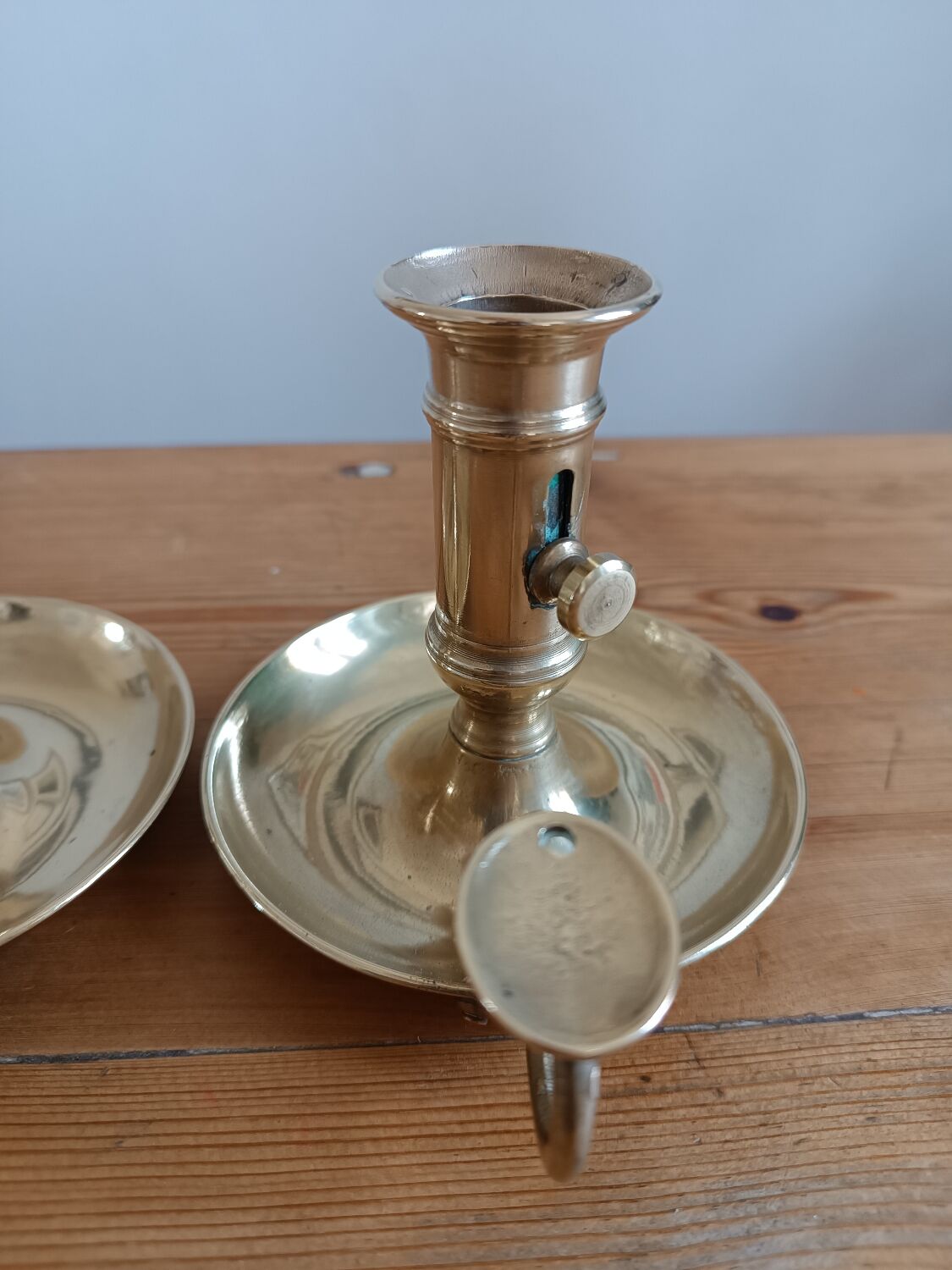 Duo of gilded brass cellar rat candlesticks