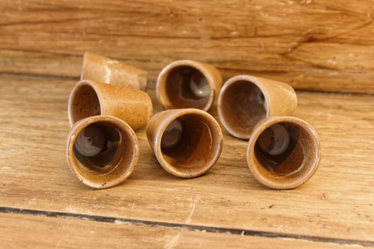 Set of 7 glasses with digestive sandstone