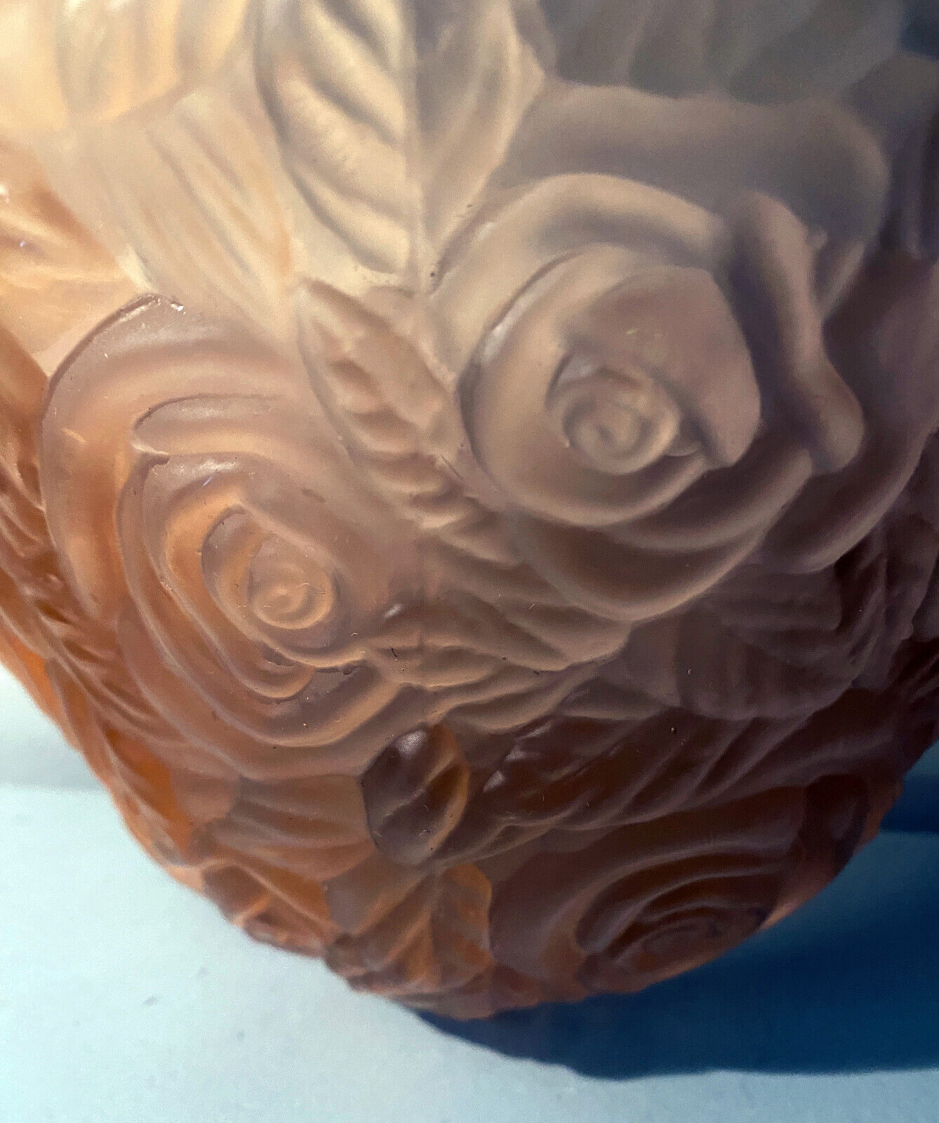 Art Deco wall lamp (1930) with rose patterns in molded pressed glass