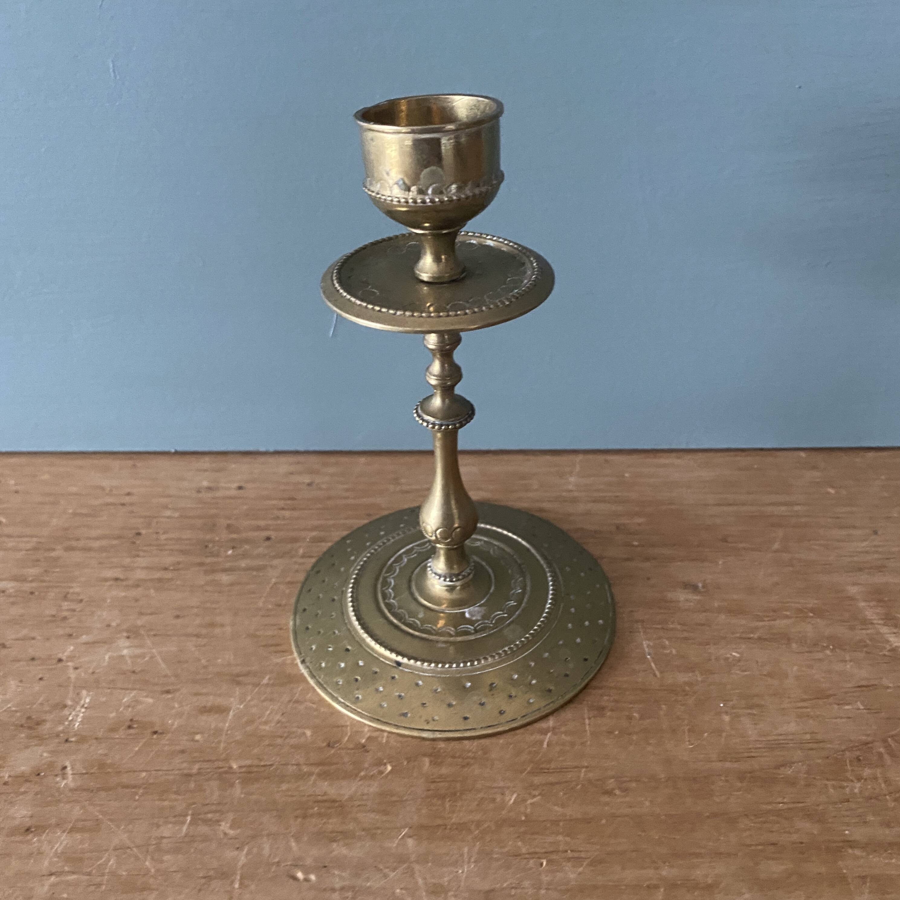 Antique brass candlestick holder