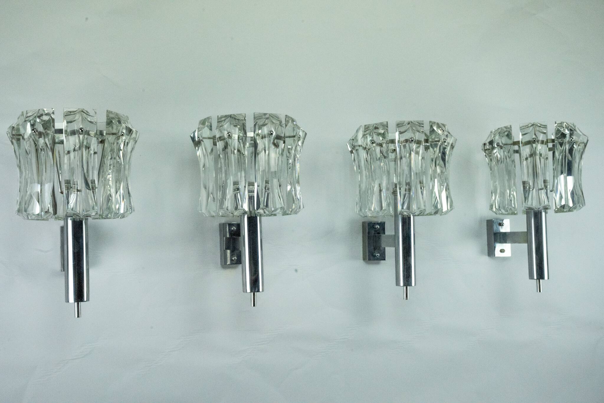 Set of four large Murano glass elements and chromed brass sconces, Italy 60