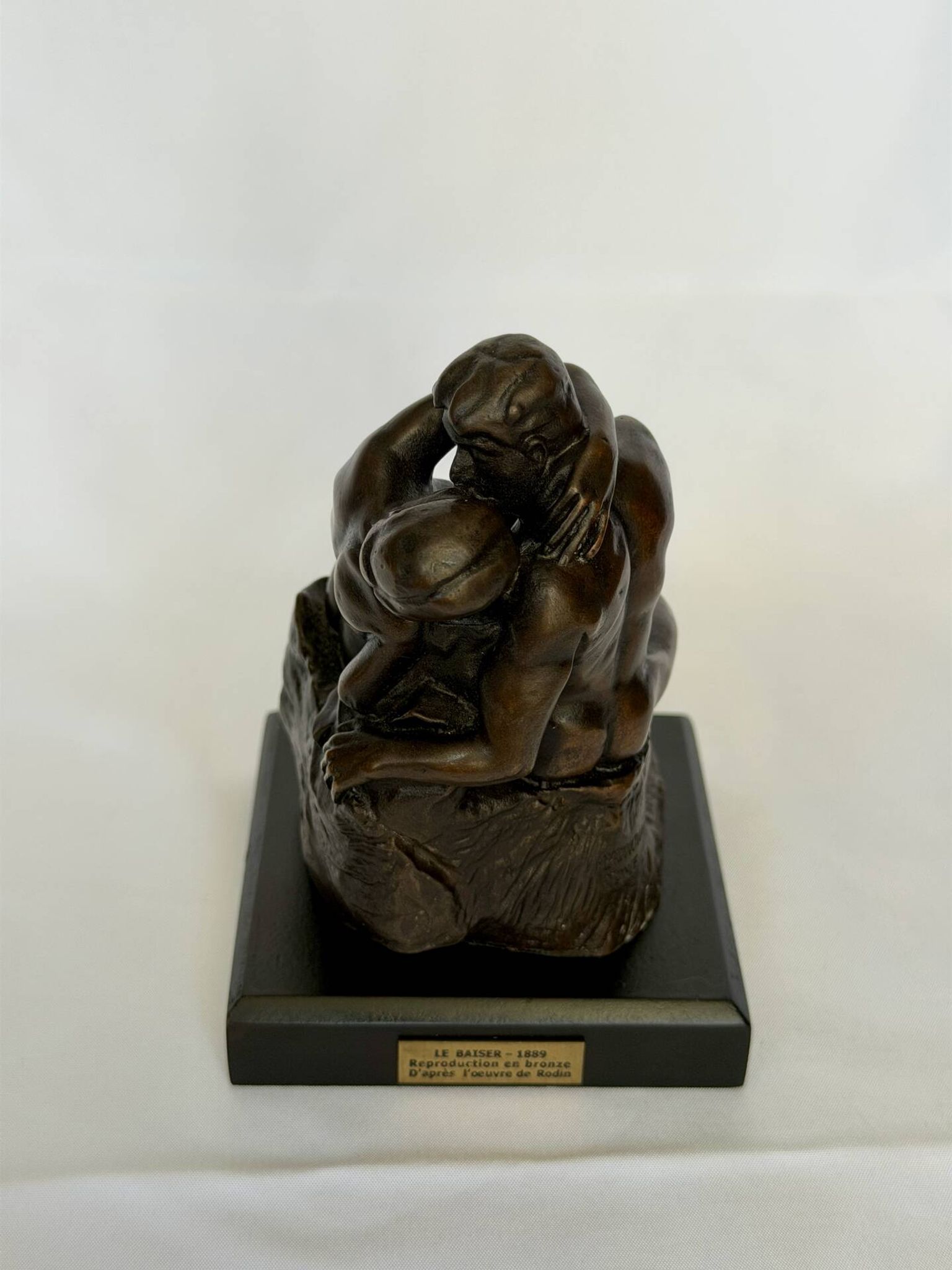 The bronze sculpture The Kiss, a reproduction of Rodin's statue, French sculpture.