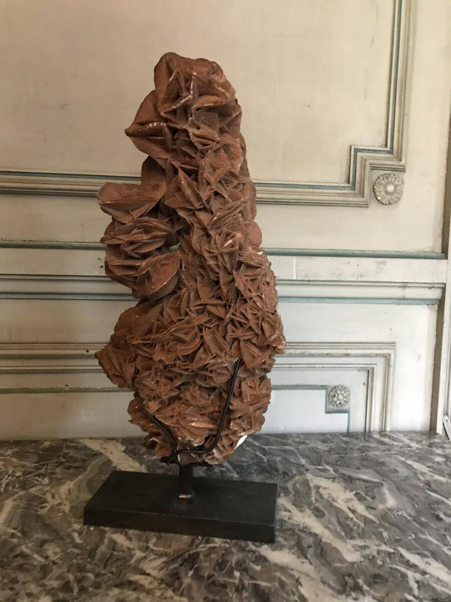 Sandy rose with a base