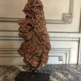 Sandy rose with a base