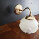 Brass wall lamp and white glass globe from the 1950s-1960s.