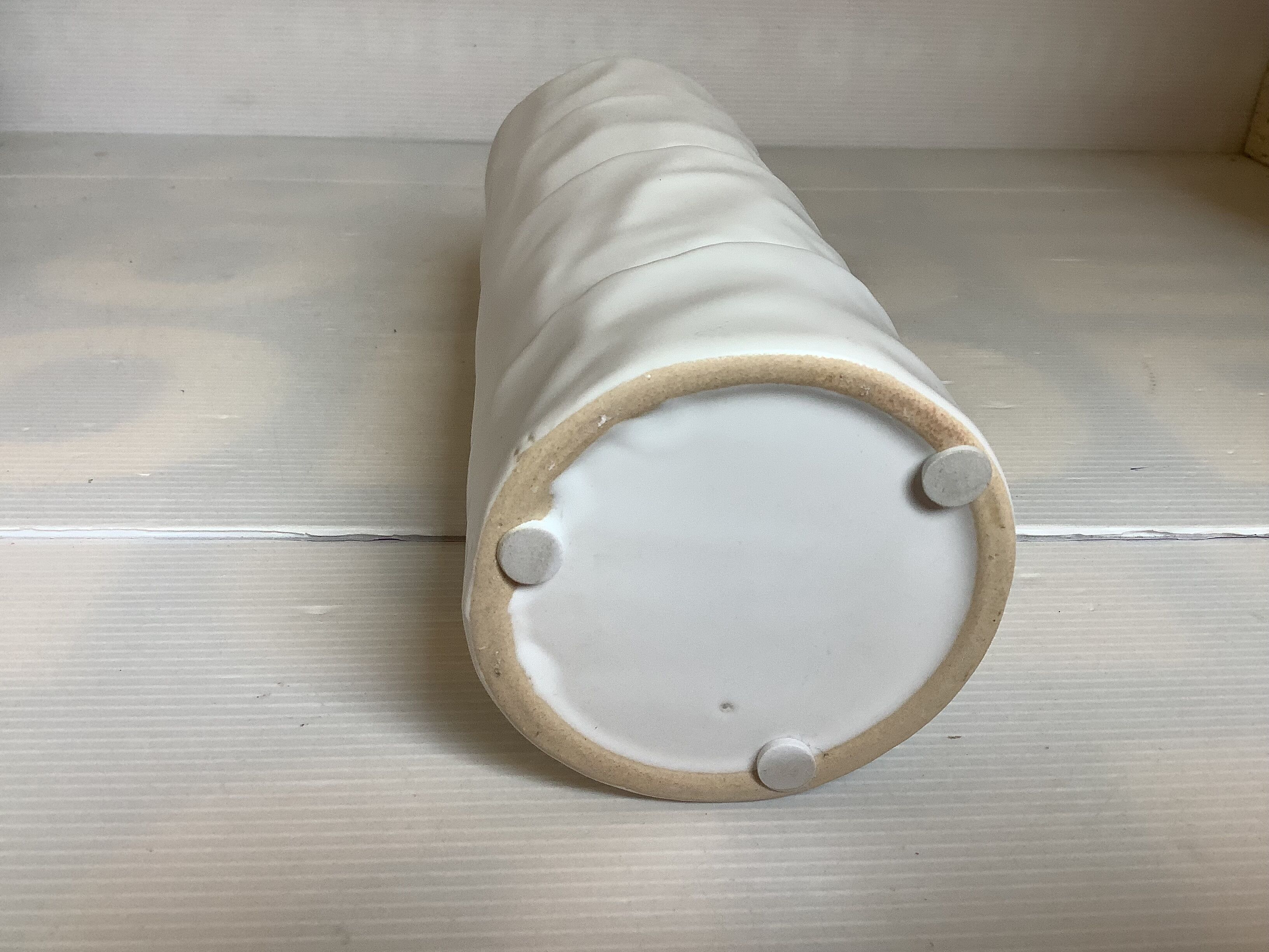 Vase with patterns of rolled paper leaves