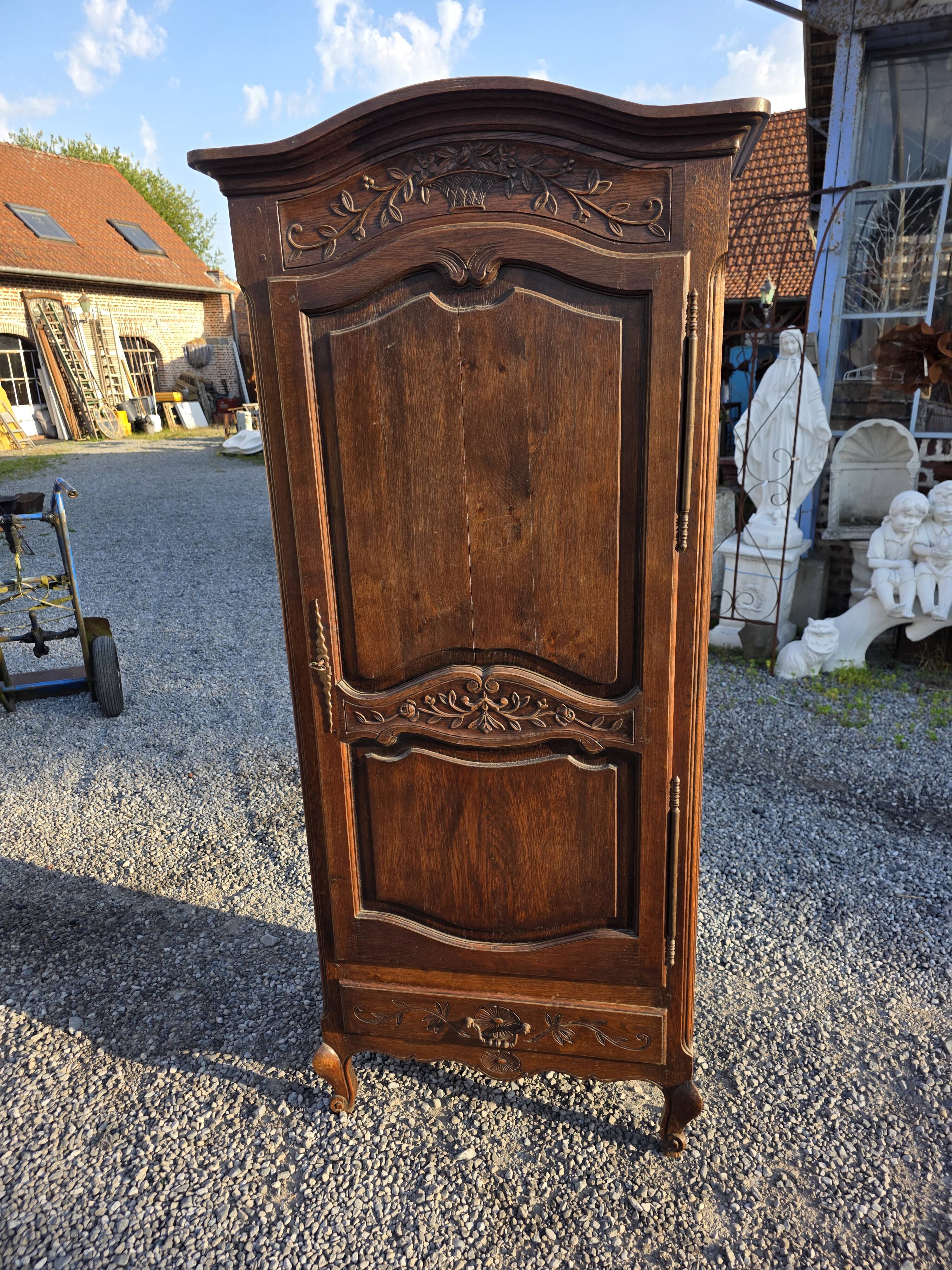 Louis XV style bonnetière in solid oak