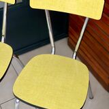Pair of yellow formica chairs