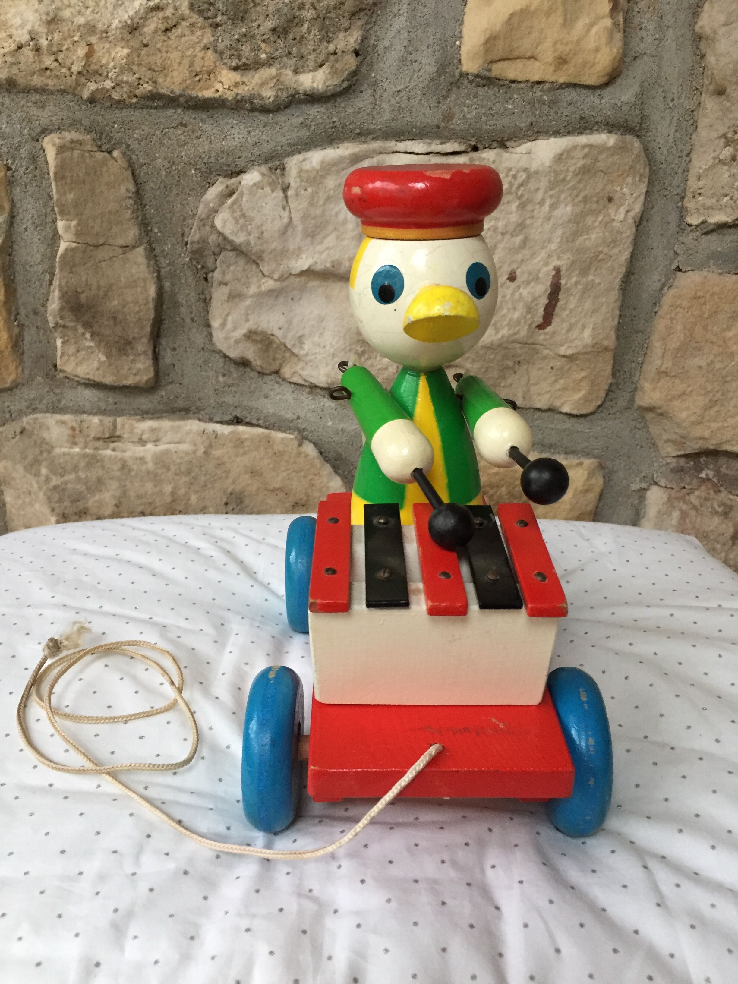 Old toy to shoot, duck and xylophone