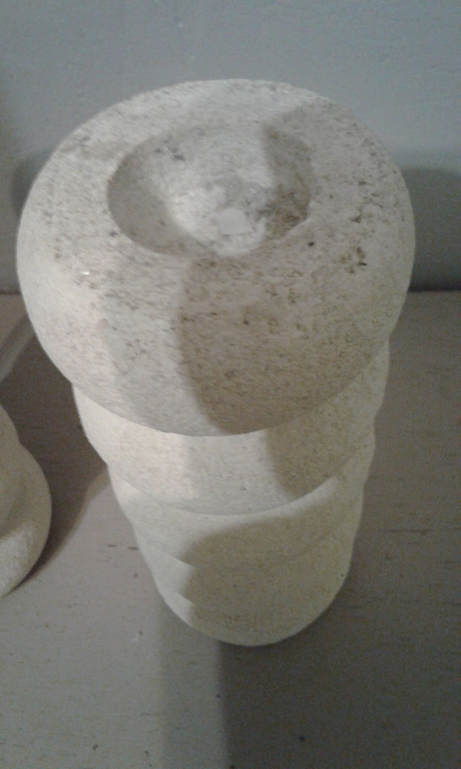 Pair of stone candlesticks