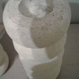 Pair of stone candlesticks