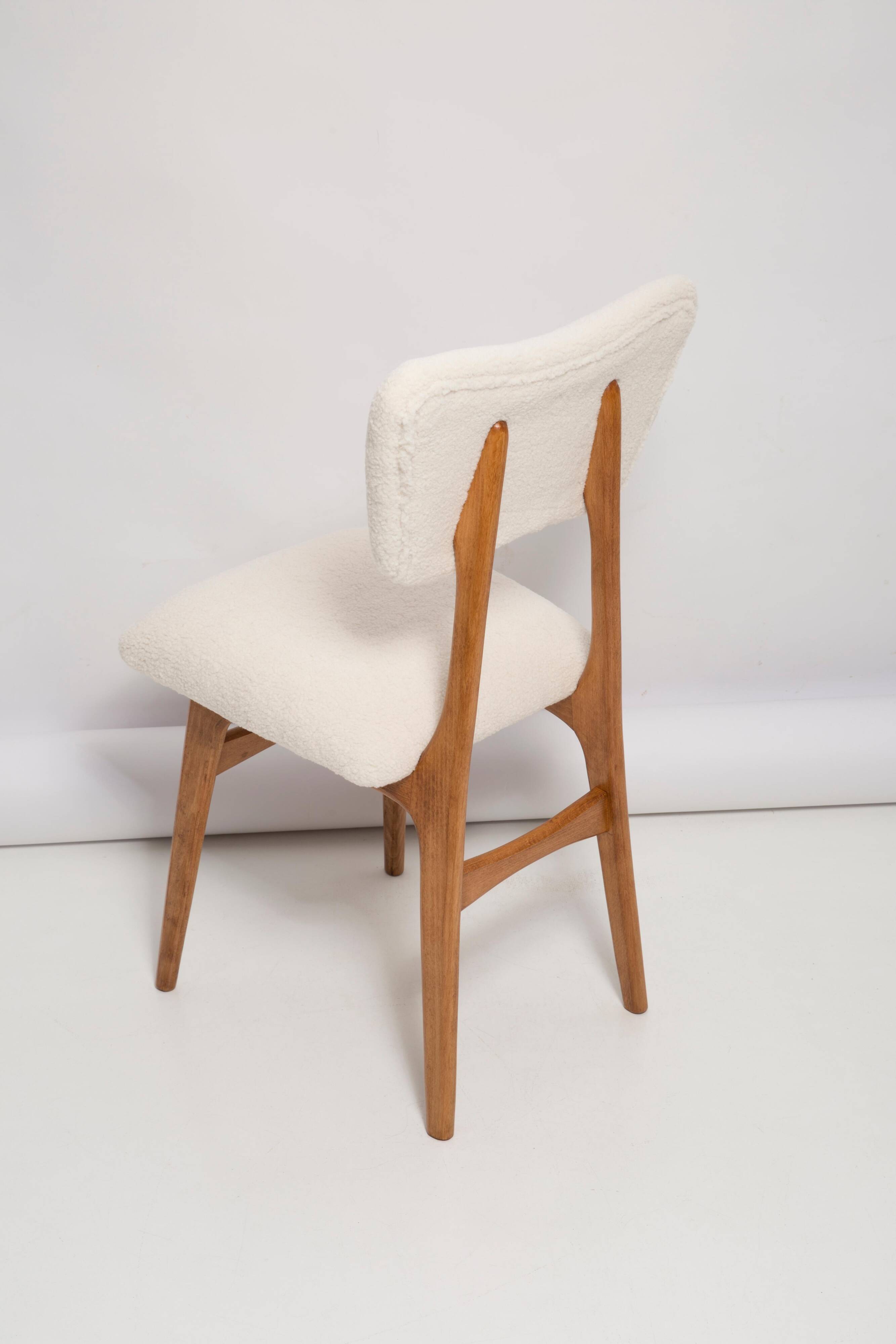 Butterfly chair in beech wood and cream boucle, Europe, 1960
