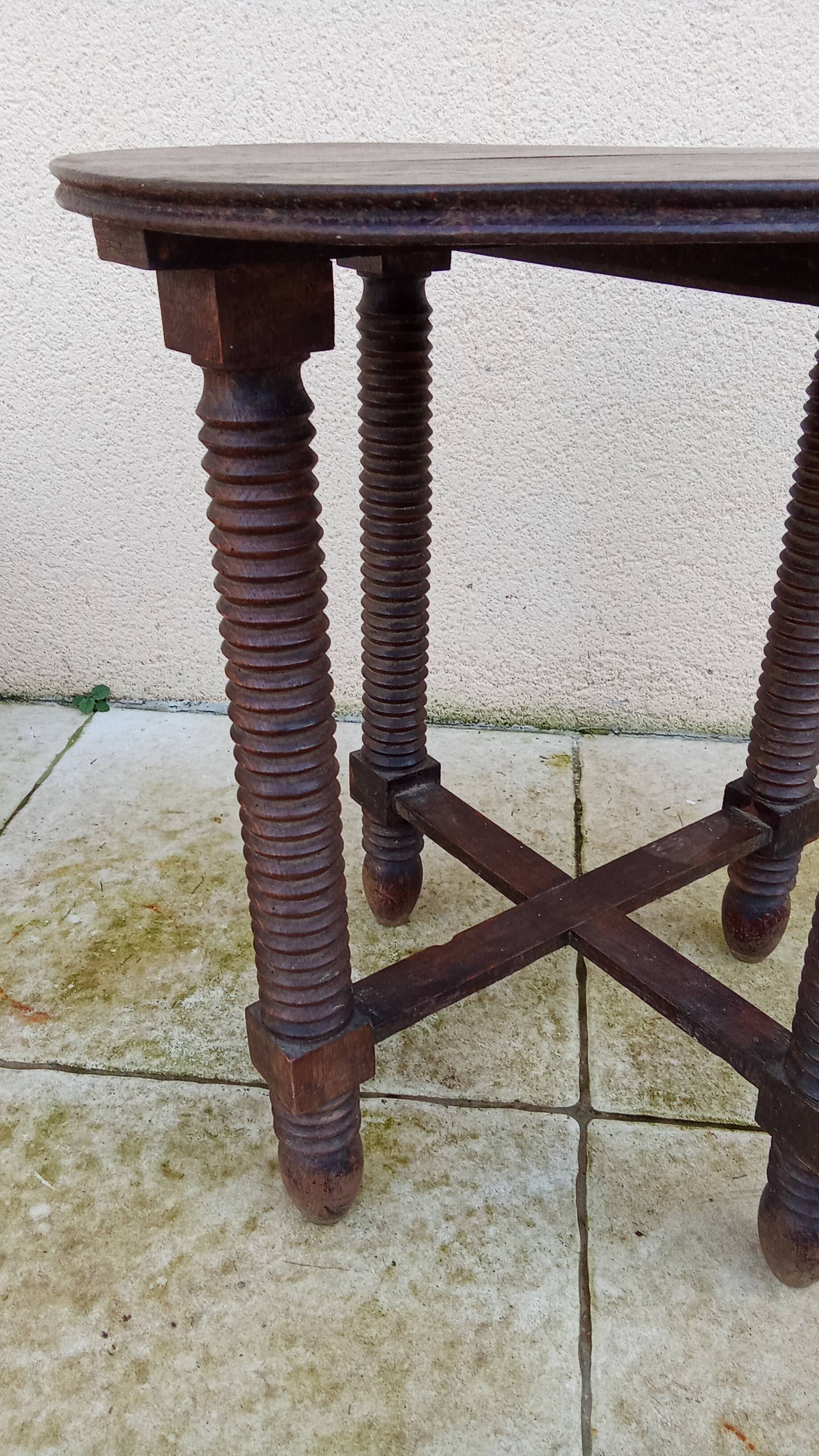 Old small round side table in Dudouyt style