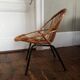 Rattan shell chair and metal feet