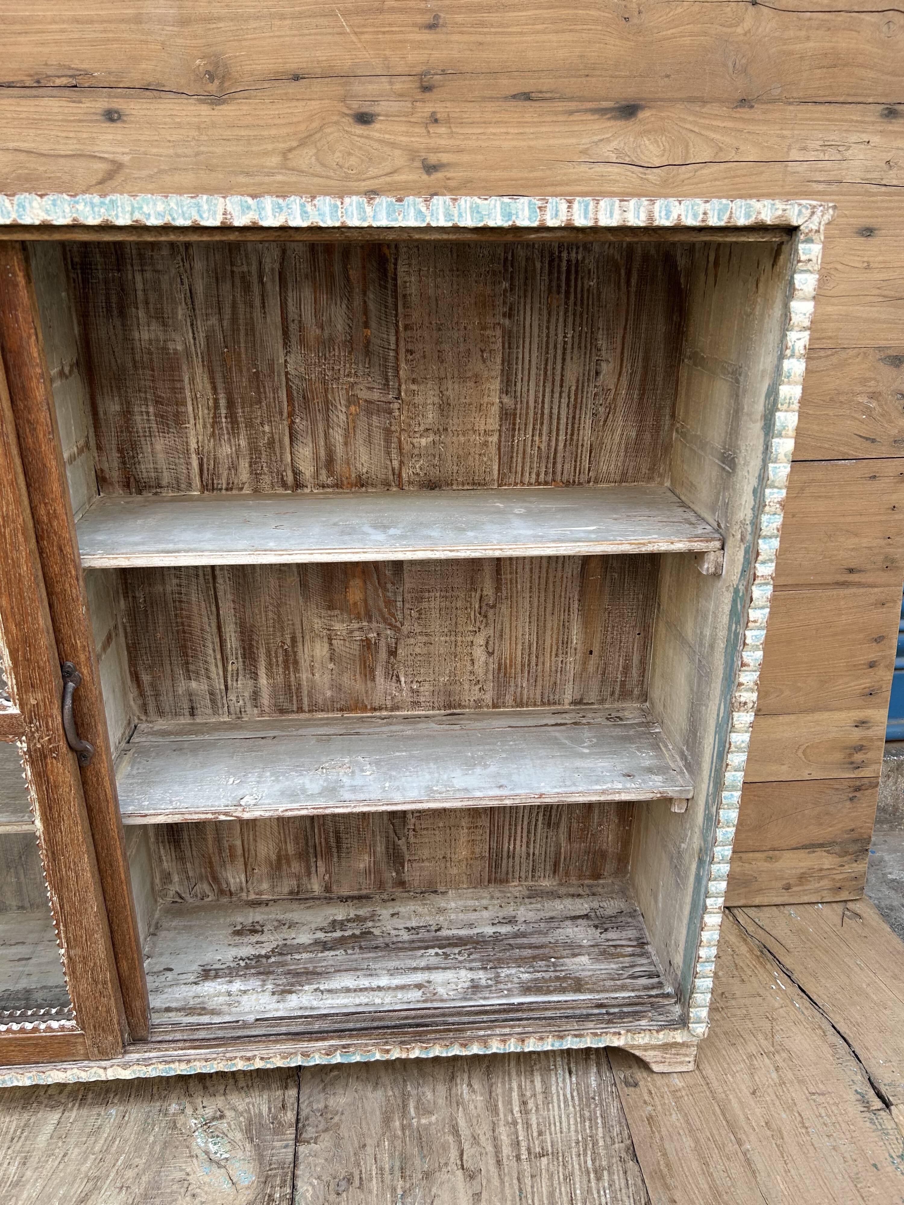 Teak display cabinet with sliding doors