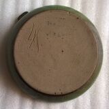 Vintage green enameled ceramic ashtray signed.