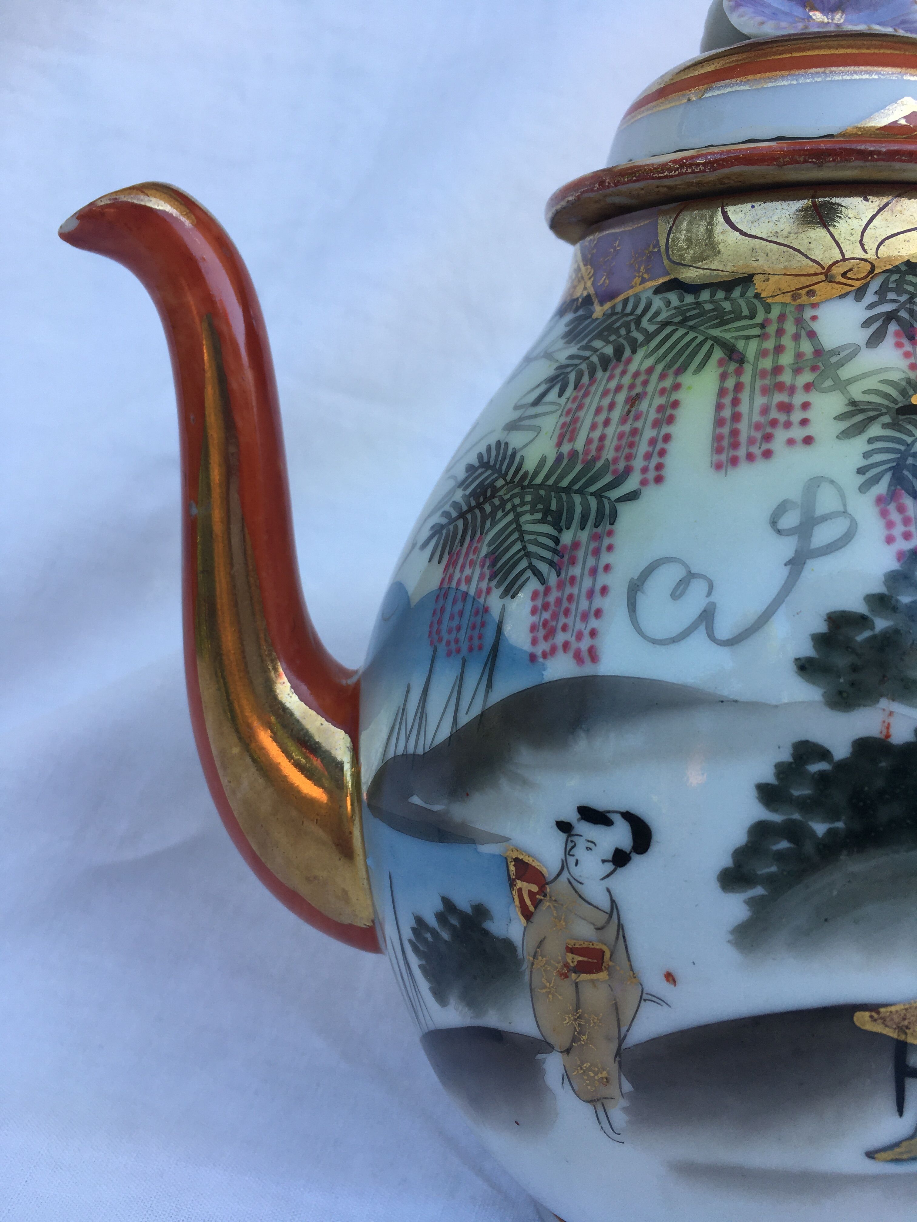 Porcelain teapot with Japanese decoration