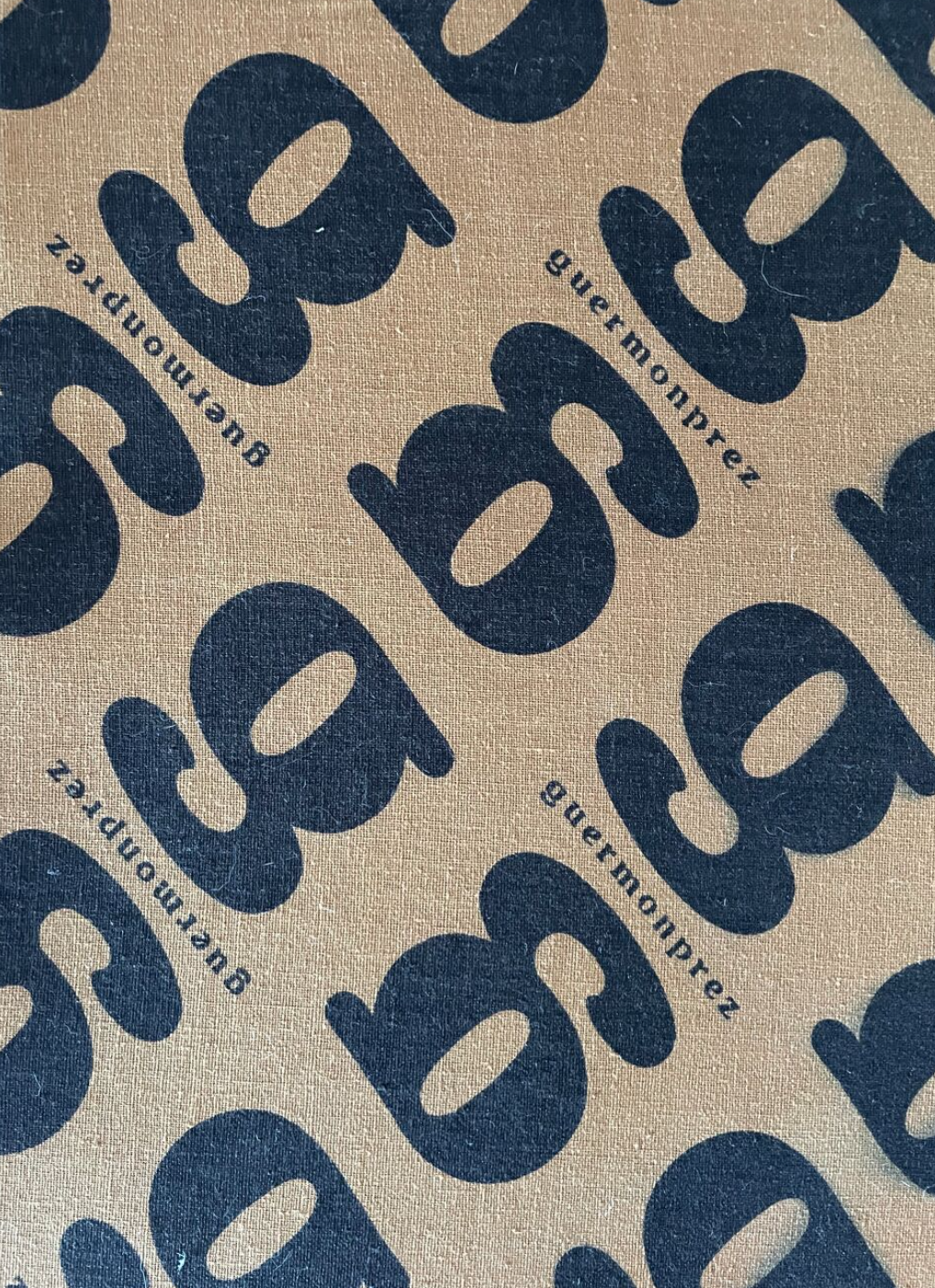 Pair of vintage armchairs Gérard Guermonprez tawny leather and stainless steel, France 1970