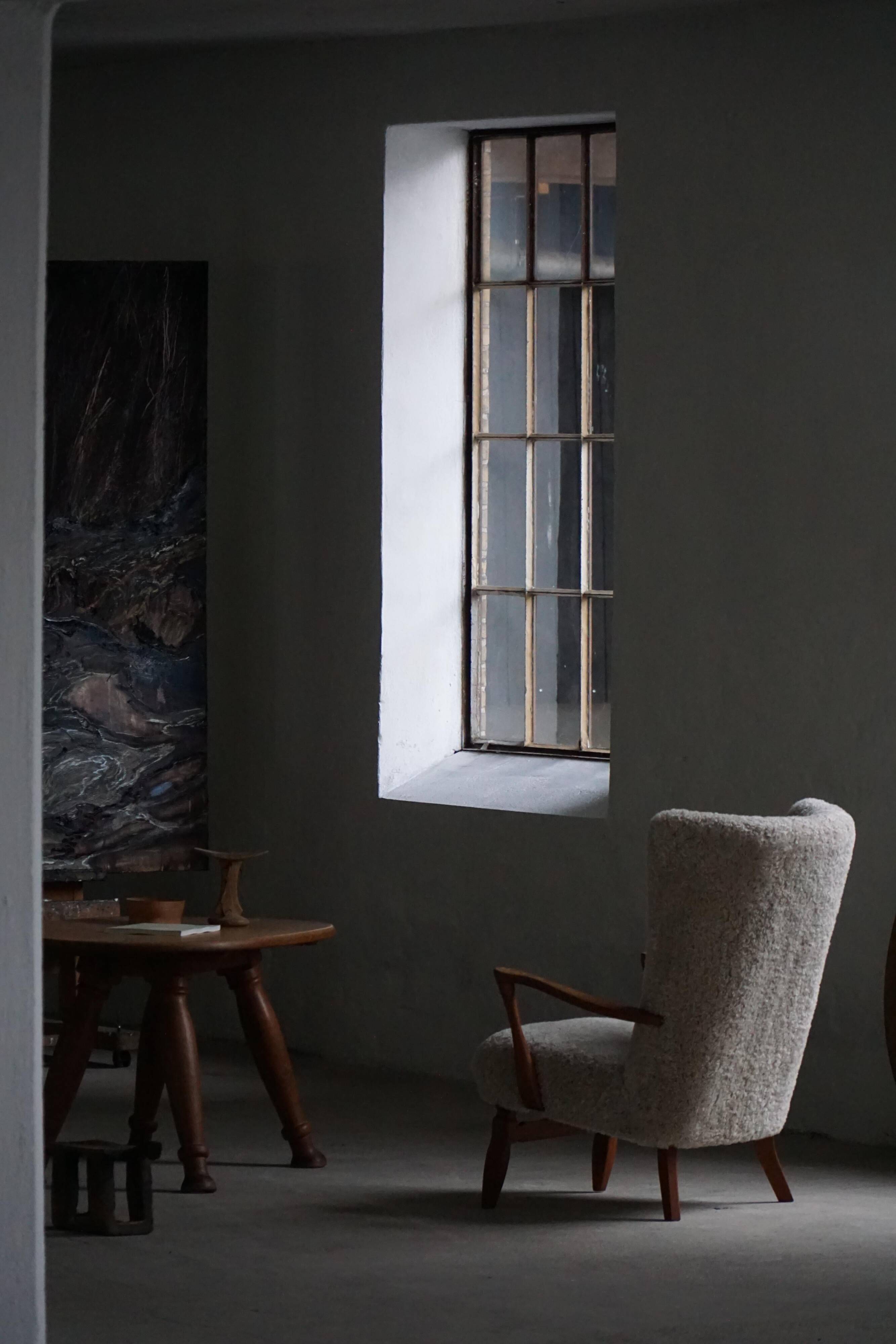 Viggo Boesen, high-back chair in oak and shearling lambskin, modern Danish design, 1950s.