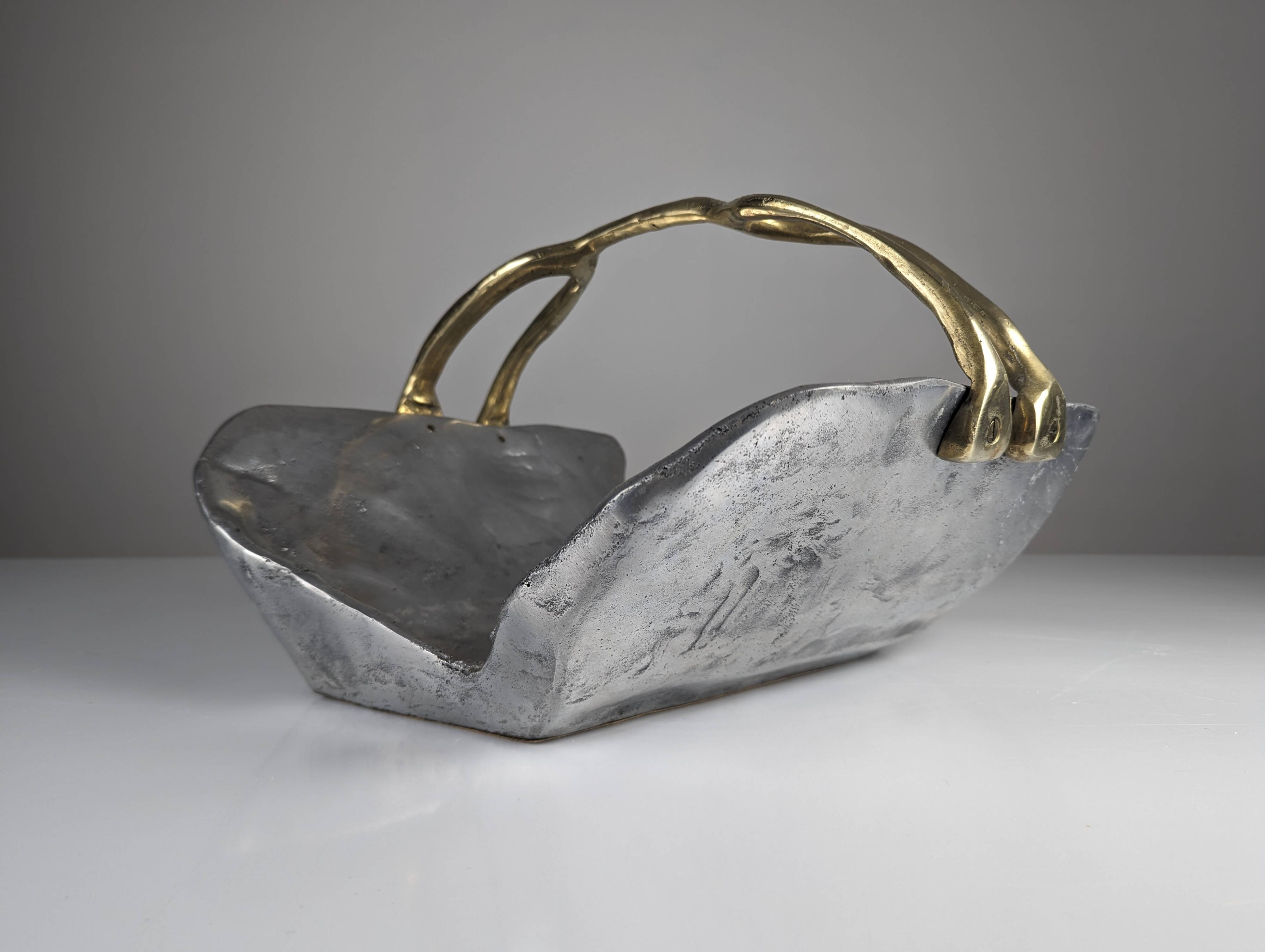 Firewood holder by David Marshall, 1980s