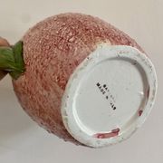 Set of ceramic fruits, a strawberry decanter and two lemon and pineapple jam jars