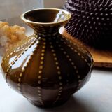 Pear-shaped ceramic vase.
