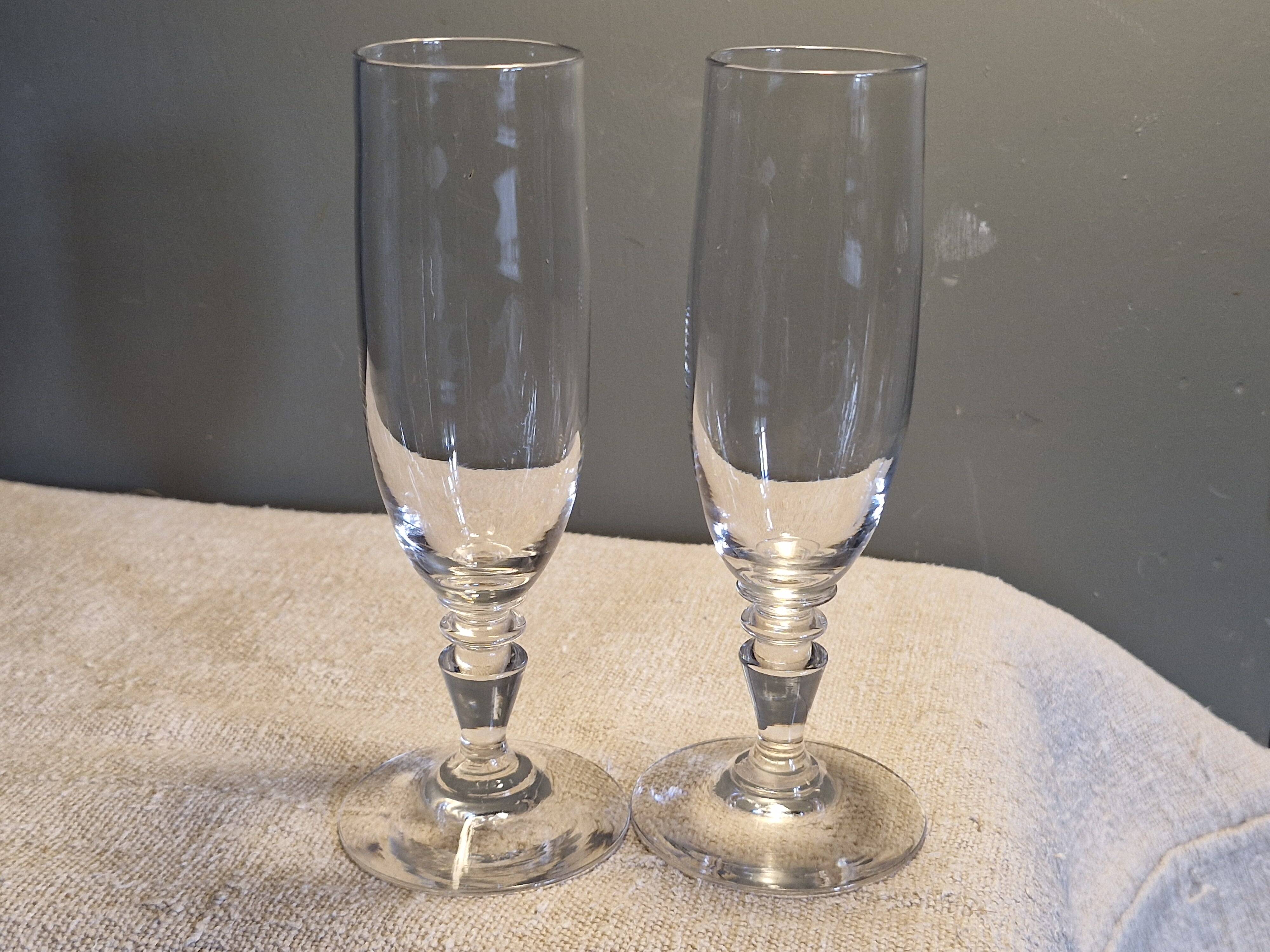 2 antique crystal champagne flutes