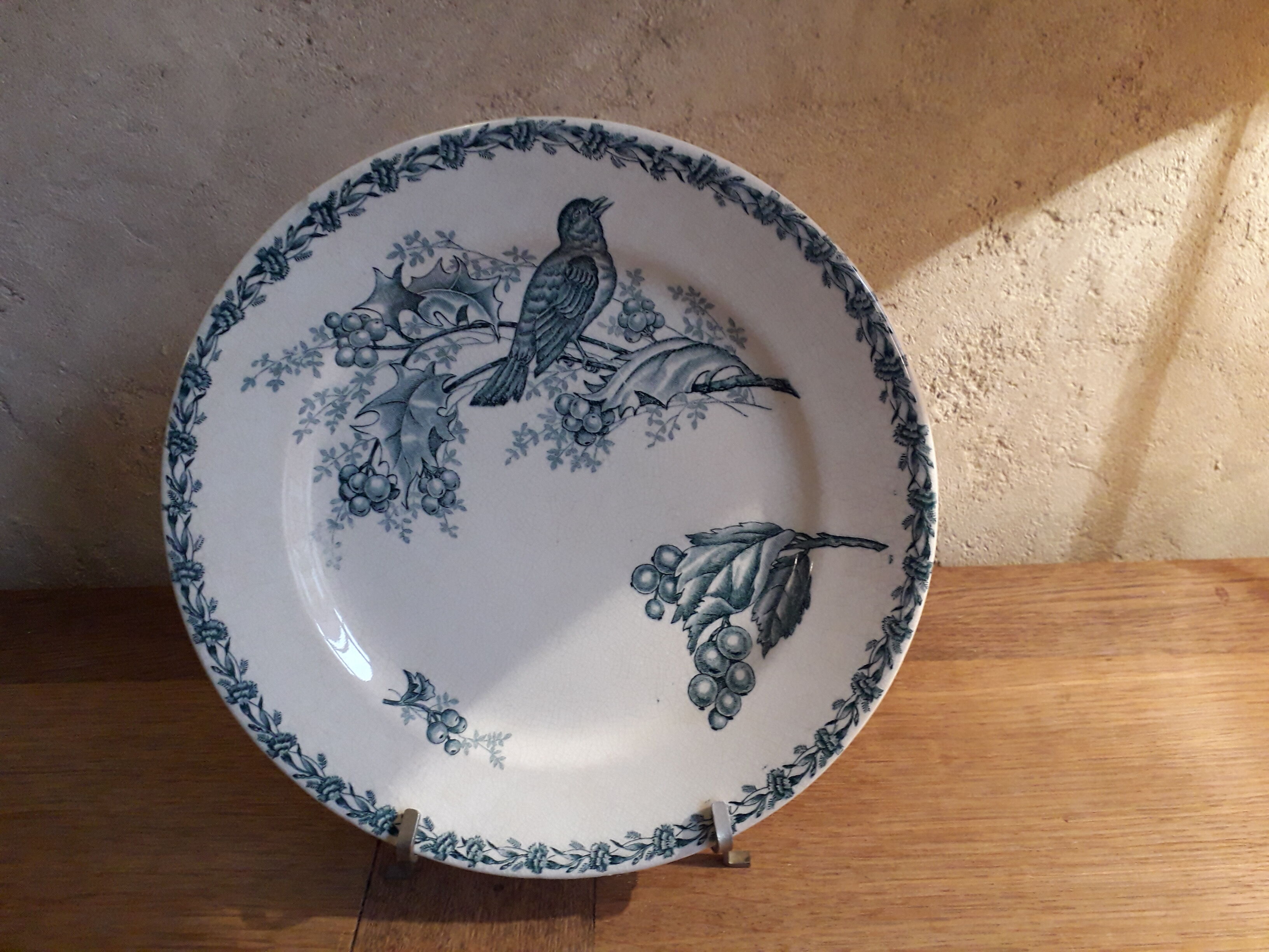 Flat plate in nimy earthenware bird decorations