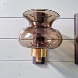 Pair of wall sconces in brass and smoked glass, 1960s.