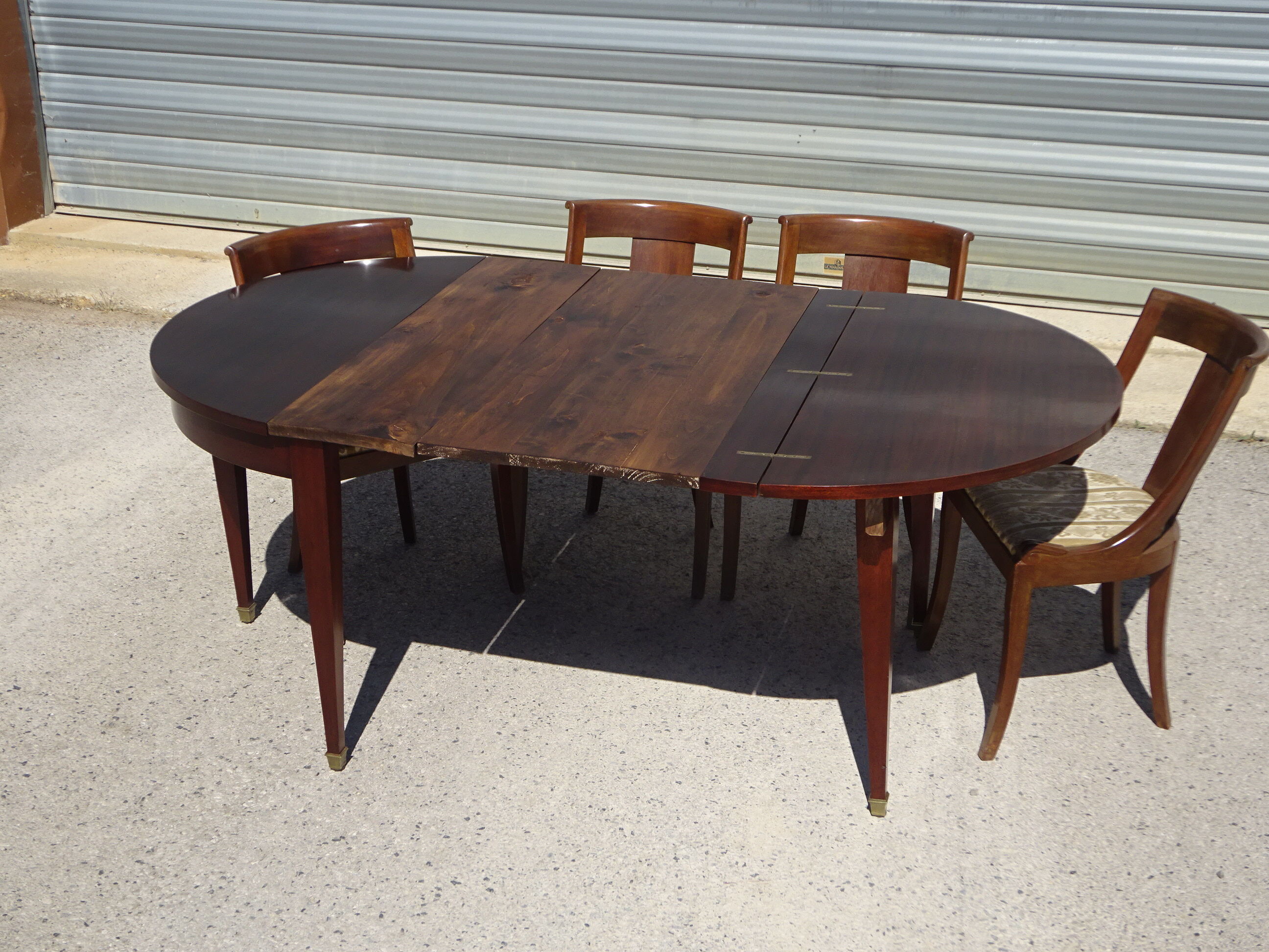Half-moon console table, extendable in Empire style.