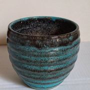 Ceramic planter with speckled enamel gadroons from the 1940s
