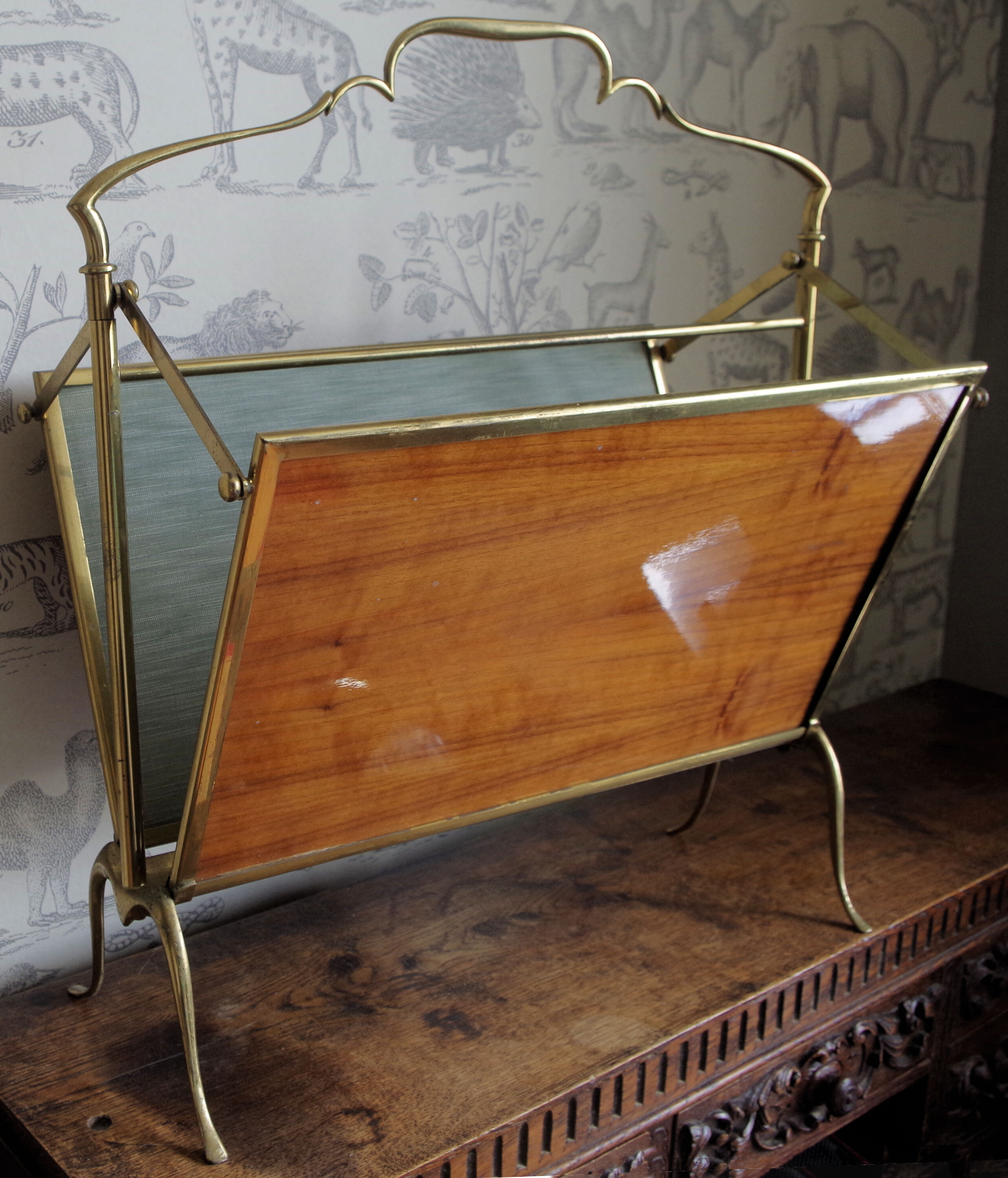 Brass folding magazine rack