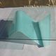 Table "sail" in curved glass by Dietmar Joester