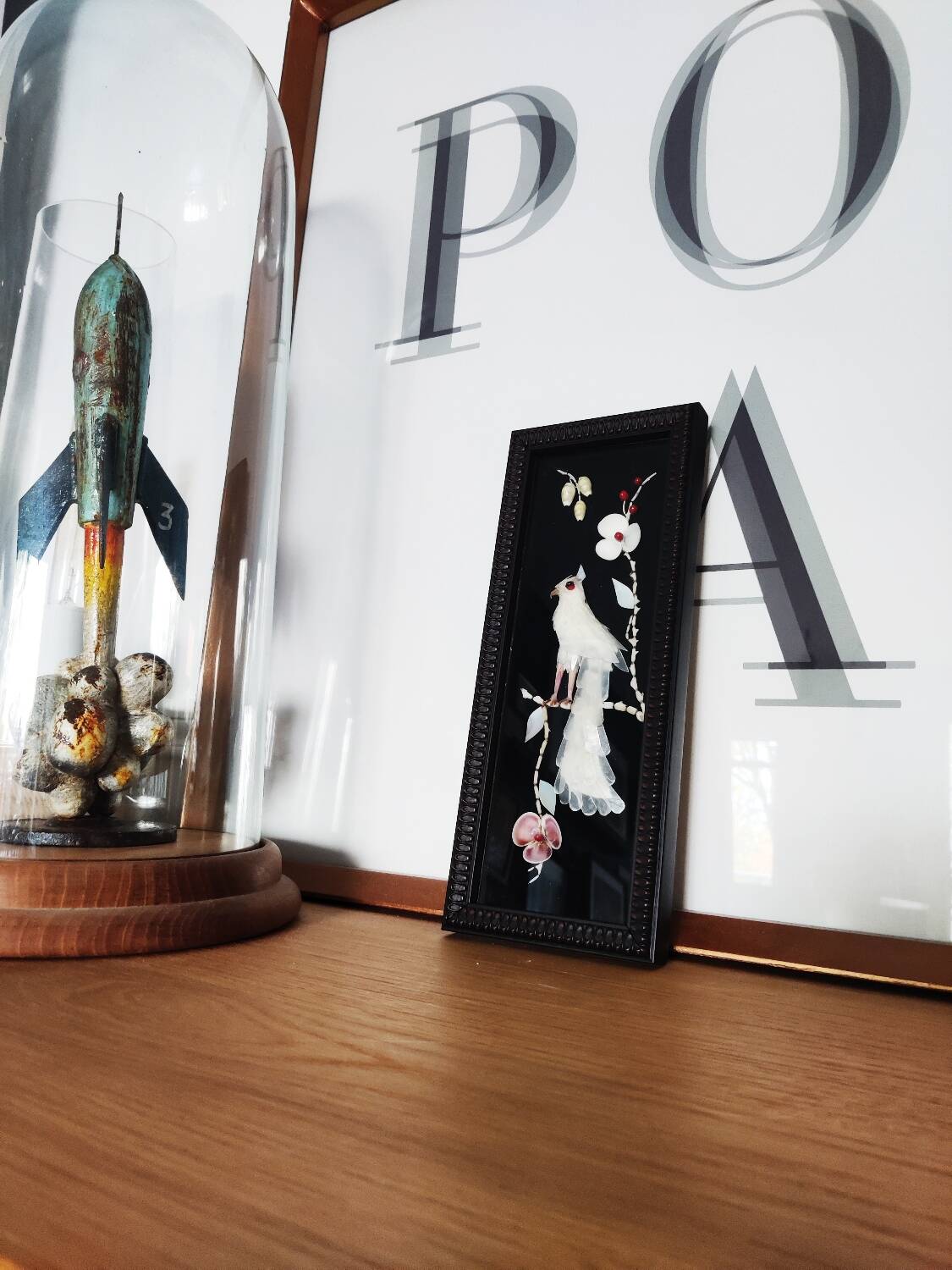 Mother-of-pearl bird still life