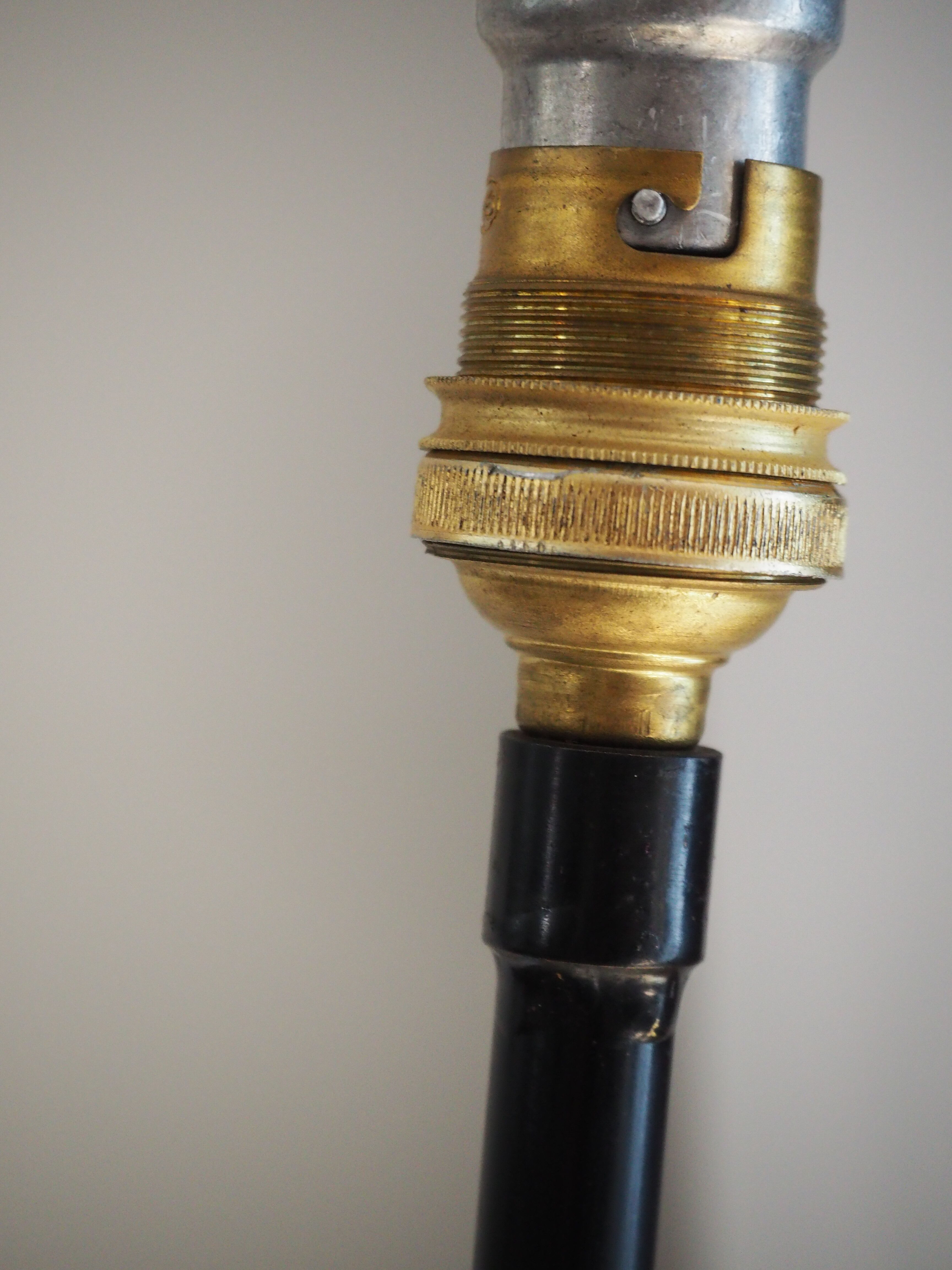 Metal tripod lamp of the 1950s