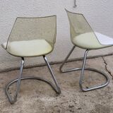 Pair of 70's smoked plexiglass and chrome chairs