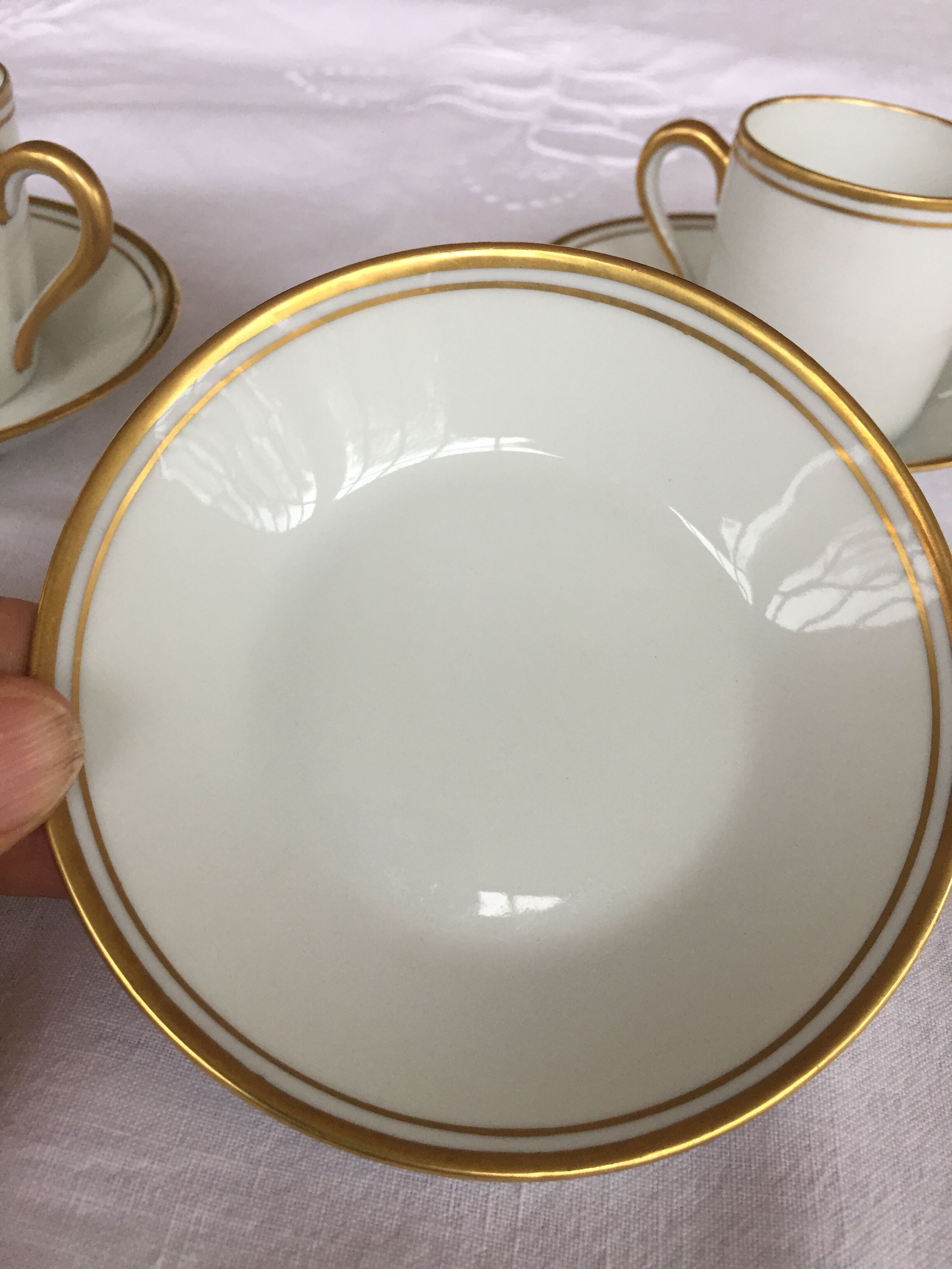 3 cups and their limoges porcelain undercup