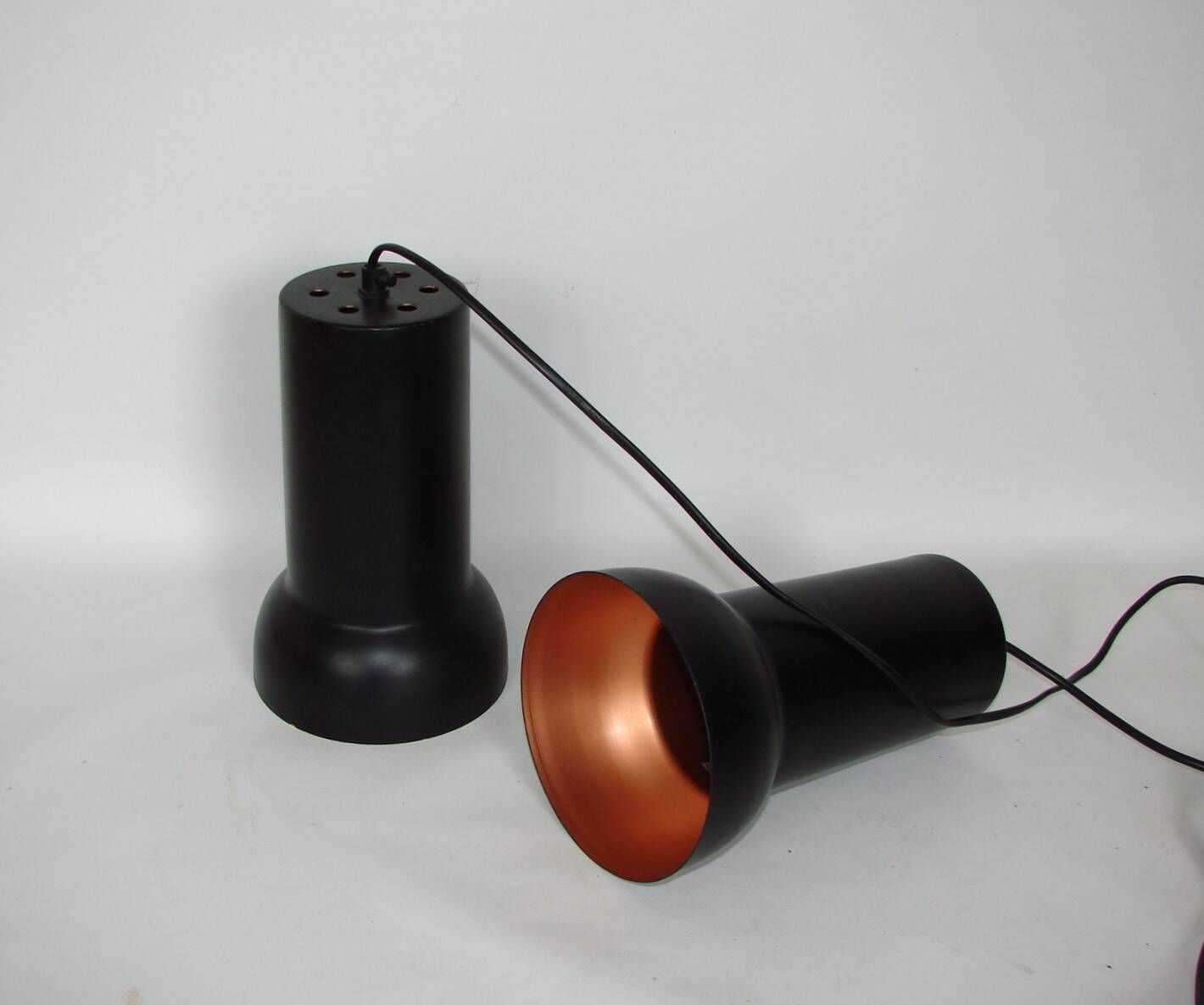A pair of vintage pendant lights – black brass, modernist